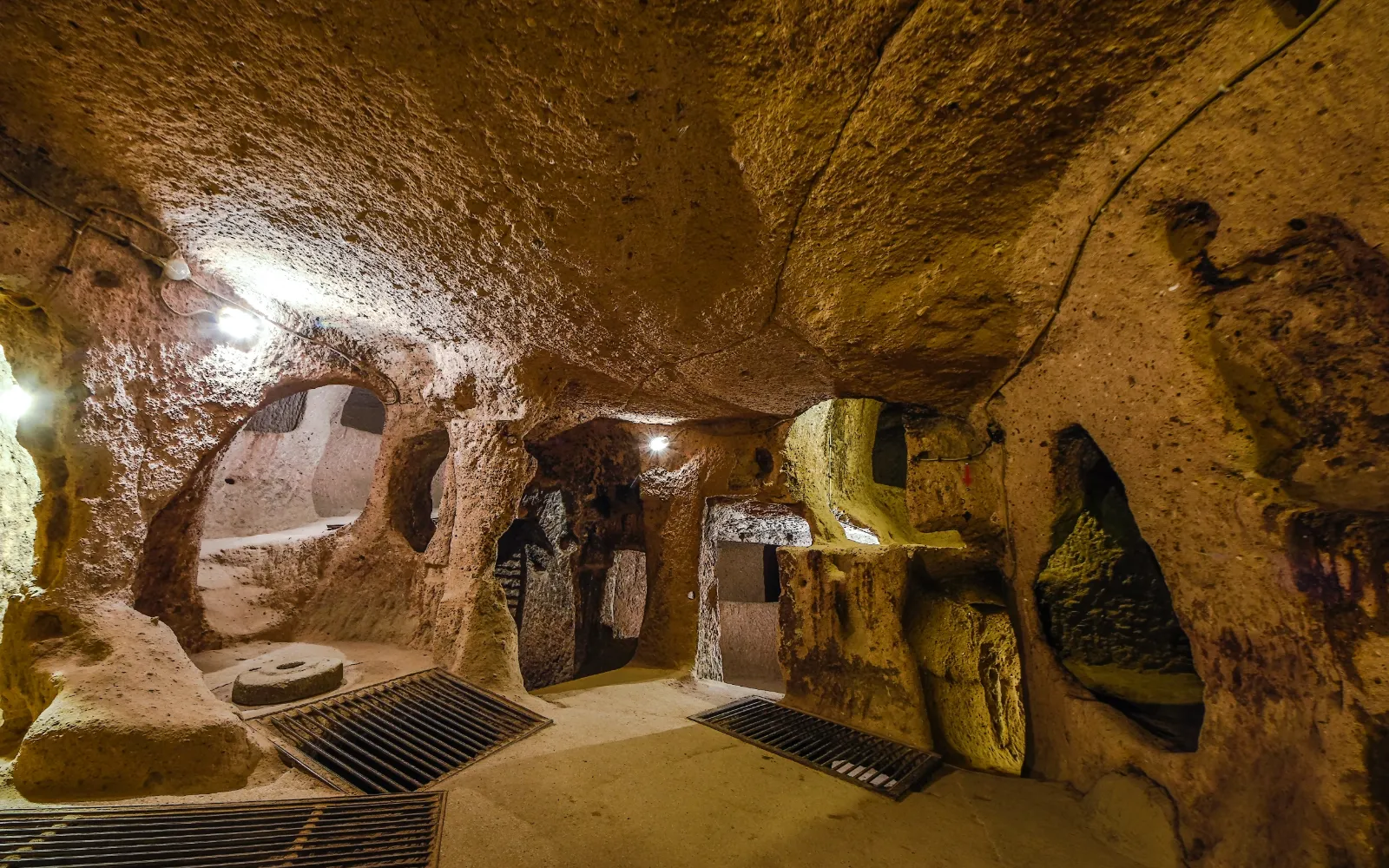 Carved stone tunnels and chambers deep within the Derinkuyu underground city, Cappadocia, Türkiye