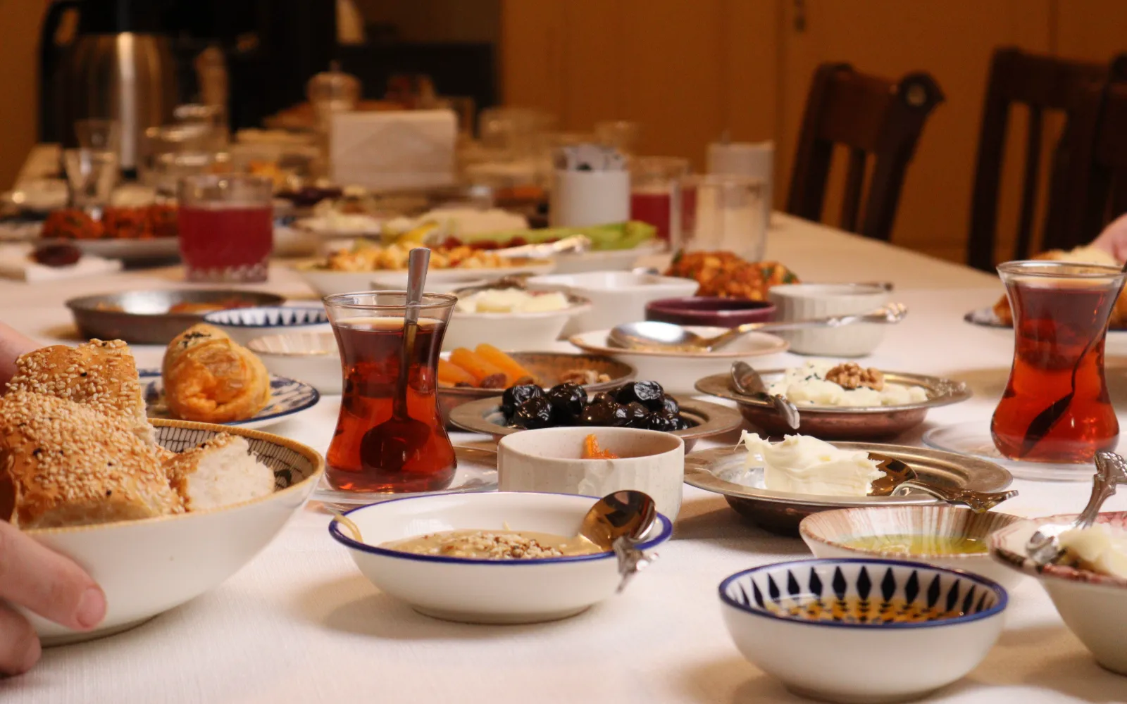 A traditional Turkish breakfast spread on a table overlooking the Bosphorus in Istanbul